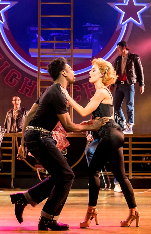 dex-lee-as-danny-zuko-and-jessica-paul-as-sandy-dumbrowski-grease-at-curve-leicester-photo-manuel-harlan